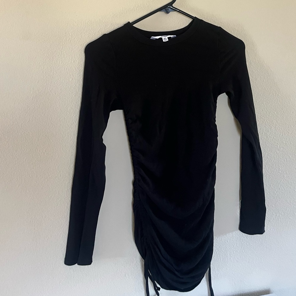 Very comfortable black dress that is scrunched on the each side (can make short)